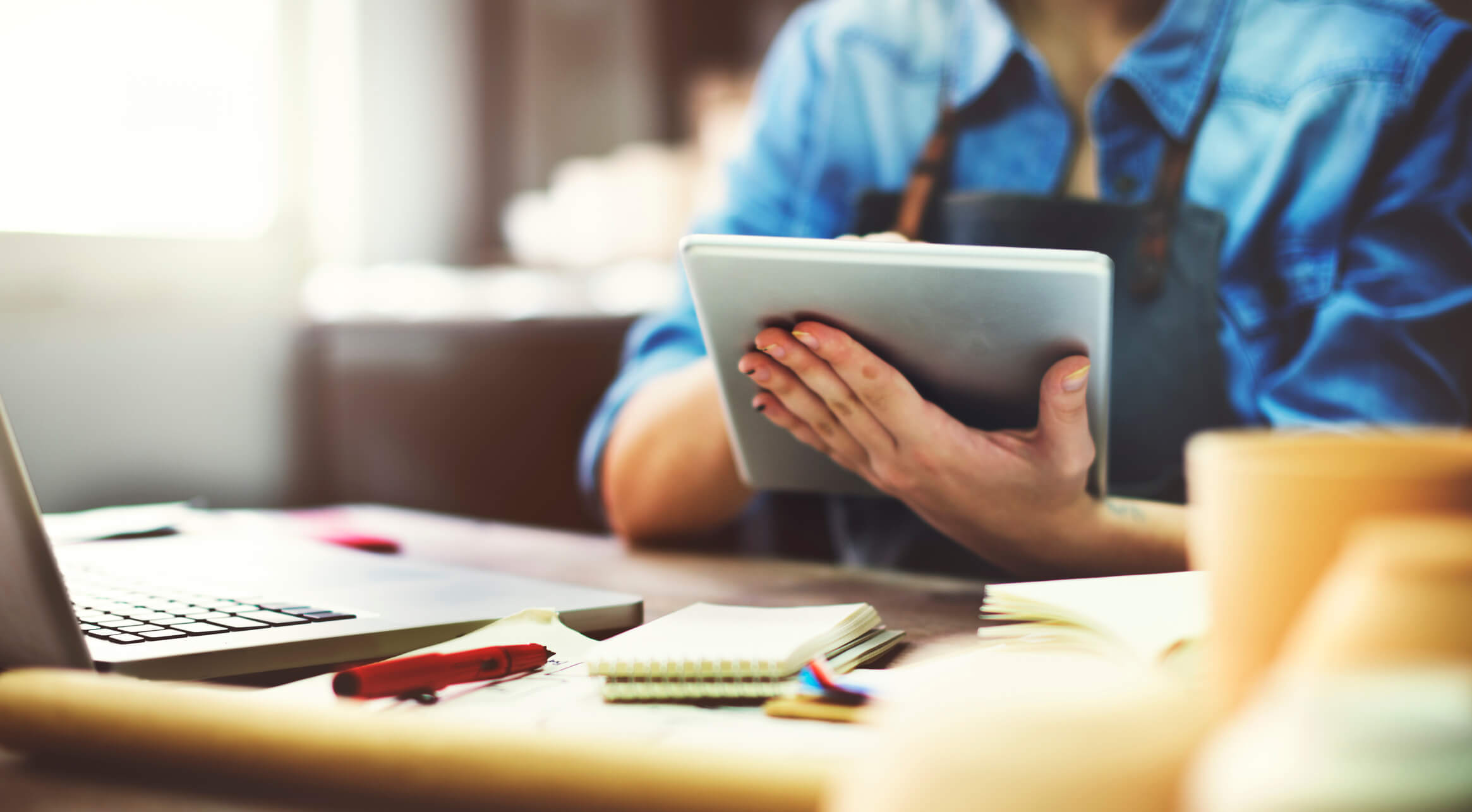 Man using tablet at desk